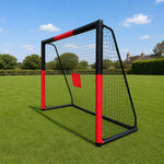 Side perspective of outdoor children football goal net with red target marker on sunny grass field