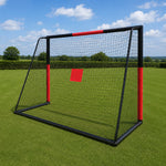 Back side of outdoor children football goal net with red target marker on sunny backyard lawn