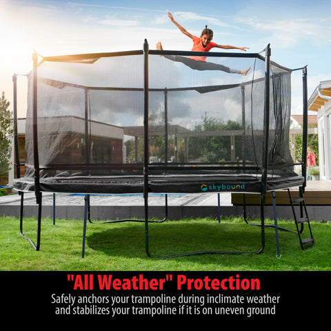 Girl jumping on Trampoline.  "All Weather"  Protection- Safely anchors your trampoline during inclimate weather and stabilizes your trampoline if it is on uneven ground.   