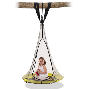 A little girl sitting on a saucer round swing hanging from a tree branch